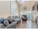 Bright living room boasts high ceilings, slider to patio, and comfortable seating at 4396 Baldwin Ave. # 34, Little River, SC 29566