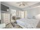 Relaxing bedroom with a comfortable bed and en-suite bathroom at 4604 Ocean Blvd. S # 4C, North Myrtle Beach, SC 29582