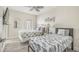 Two twin beds in a bright bedroom with balcony access at 4604 Ocean Blvd. S # 4C, North Myrtle Beach, SC 29582