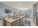 Granite kitchen island with seating for multiple people at 4604 Ocean Blvd. S # 4C, North Myrtle Beach, SC 29582
