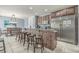 Modern kitchen with stainless steel appliances and breakfast bar at 4604 Ocean Blvd. S # 4C, North Myrtle Beach, SC 29582