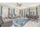 Spacious living area featuring comfortable seating and a large window at 4604 Ocean Blvd. S # 4C, North Myrtle Beach, SC 29582