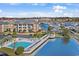 Aerial view of condo building with pool and marina in the background at 4641 Lightkeepers Way # 3A, Little River, SC 29566