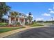 Community clubhouse with lighthouse and landscaping at 4641 Lightkeepers Way # 3A, Little River, SC 29566