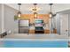Eat-in kitchen with stainless steel appliances and wood cabinets at 4641 Lightkeepers Way # 3A, Little River, SC 29566