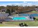 Community pool with surrounding landscaping at 4641 Lightkeepers Way # 3A, Little River, SC 29566