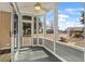 Relaxing screened porch overlooking a grassy yard at 4641 Lightkeepers Way # 3A, Little River, SC 29566
