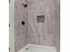 Updated shower with modern tile and fixtures at 4641 Lightkeepers Way # 3A, Little River, SC 29566