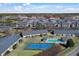 Community tennis courts and pool area at 4641 Lightkeepers Way # 3A, Little River, SC 29566