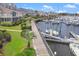 Wooden boardwalk along the marina with many boats at 4641 Lightkeepers Way # 3A, Little River, SC 29566