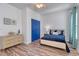 Nicely decorated bedroom with a full-sized bed, closet, and dresser at 502 Castellar Ln., Little River, SC 29566