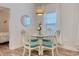 Dining room featuring a round glass table and seating for four at 502 Castellar Ln., Little River, SC 29566