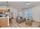 Inviting living room with modern furnishings and natural light creates a cozy atmosphere for relaxation and entertainment at 502 Castellar Ln., Little River, SC 29566