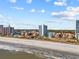 Breathtaking aerial view of the coastline, showcasing the pristine beach and high-rise buildings at 5511 N Ocean Blvd. # 302, Myrtle Beach, SC 29577