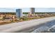 Beautiful aerial shot of the beachfront featuring white sand, ocean waves, and nearby hotels and condos at 5511 N Ocean Blvd. # 302, Myrtle Beach, SC 29577