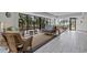 Bright lobby featuring comfortable seating areas with sofas and chairs with outside views, creating a relaxing and inviting atmosphere at 5511 N Ocean Blvd. # 302, Myrtle Beach, SC 29577