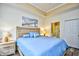 King bedroom with ensuite bathroom access and light wood furnishings at 6015 Catalina Dr. # 431, North Myrtle Beach, SC 29582