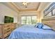 King bedroom with large windows and plenty of natural light, dresser and TV at 6015 Catalina Dr. # 431, North Myrtle Beach, SC 29582