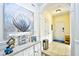 Bright entryway with coastal-themed decor and tile flooring at 6015 Catalina Dr. # 431, North Myrtle Beach, SC 29582