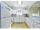 Efficient kitchen with white cabinets, granite countertops, and stainless steel appliances at 6015 Catalina Dr. # 431, North Myrtle Beach, SC 29582