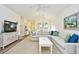 Spacious living room with an open floor plan, showing the kitchen and dining area at 6015 Catalina Dr. # 431, North Myrtle Beach, SC 29582