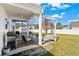 Relaxing backyard with patio, swing, and spacious grassy area at 626 Notting Hill Ct., Conway, SC 29526