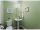 Small bathroom with pedestal sink and toilet at 626 Notting Hill Ct., Conway, SC 29526