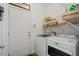 Laundry room with washer, dryer, and shelving at 626 Notting Hill Ct., Conway, SC 29526