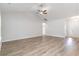 Spacious living room featuring vaulted ceilings and light hardwood-look floors at 643 Woodside Dr., Conway, SC 29526