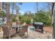 Outdoor space with table, chairs, and grill; Ideal for relaxation and outdoor dining at 6716 Wisteria Dr., Myrtle Beach, SC 29588
