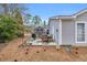 Private outdoor patio with a grill, seating, and shed - perfect for entertaining at 6716 Wisteria Dr., Myrtle Beach, SC 29588