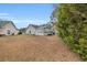 Wide angle view of home's backyard showing a well maintained lawn at 6716 Wisteria Dr., Myrtle Beach, SC 29588