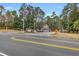 Community entrance featuring signage, landscaping, and a charming gazebo area at 6716 Wisteria Dr., Myrtle Beach, SC 29588