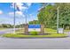 Entrance sign for Myrtle Beach Golf & Yacht Club with manicured landscaping at 6716 Wisteria Dr., Myrtle Beach, SC 29588