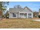 A cozy single-Gathering home with a well-maintained lawn and inviting front entrance at 6716 Wisteria Dr., Myrtle Beach, SC 29588
