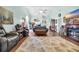 Expansive living room with hardwood floors, cozy seating, fireplace and great flow for entertaining guests at 6716 Wisteria Dr., Myrtle Beach, SC 29588
