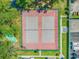 Aerial view of tennis courts features two full-size courts and shuffleboard courts for residents to enjoy at 6716 Wisteria Dr., Myrtle Beach, SC 29588
