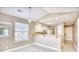 Dining area with natural light, breakfast bar, and view of kitchen at 677 Tupelo Ln. # 301, Longs, SC 29568