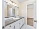 Bathroom boasts a vanity with granite countertop at 7602 Porcher Dr. # C, Myrtle Beach, SC 29572