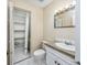Small bathroom with toilet, sink, and storage at 7602 Porcher Dr. # C, Myrtle Beach, SC 29572