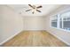 Bright bedroom with light walls and wood-look floors at 7602 Porcher Dr. # C, Myrtle Beach, SC 29572
