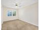 Spacious bedroom with neutral carpeting and ceiling fan at 7602 Porcher Dr. # C, Myrtle Beach, SC 29572