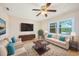 Spacious living room featuring neutral decor and hardwood floors at 7602 Porcher Dr. # C, Myrtle Beach, SC 29572
