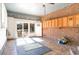 Attached garage with tiled floor, storage cabinets, and access to outdoors at 804 Geddings Dr., Myrtle Beach, SC 29588