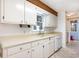 White kitchen with ample counter space and a built-in dishwasher at 804 Geddings Dr., Myrtle Beach, SC 29588