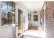 Sunroom with wood floors, ceiling fan, and windows offering natural light at 804 Geddings Dr., Myrtle Beach, SC 29588