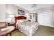 King bedroom with a small sitting area and closet at 9994 Beach Club Dr. # 1606, Myrtle Beach, SC 29572