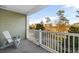 Balcony with white adirondack chairs, offering a view of nature at 1009 World Tour Blvd. # 304, Myrtle Beach, SC 29579