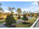 Balcony with scenic views of a golf course and pond at 1009 World Tour Blvd. # 304, Myrtle Beach, SC 29579