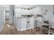 Well-equipped kitchen with white cabinets and granite countertops at 1009 World Tour Blvd. # 304, Myrtle Beach, SC 29579